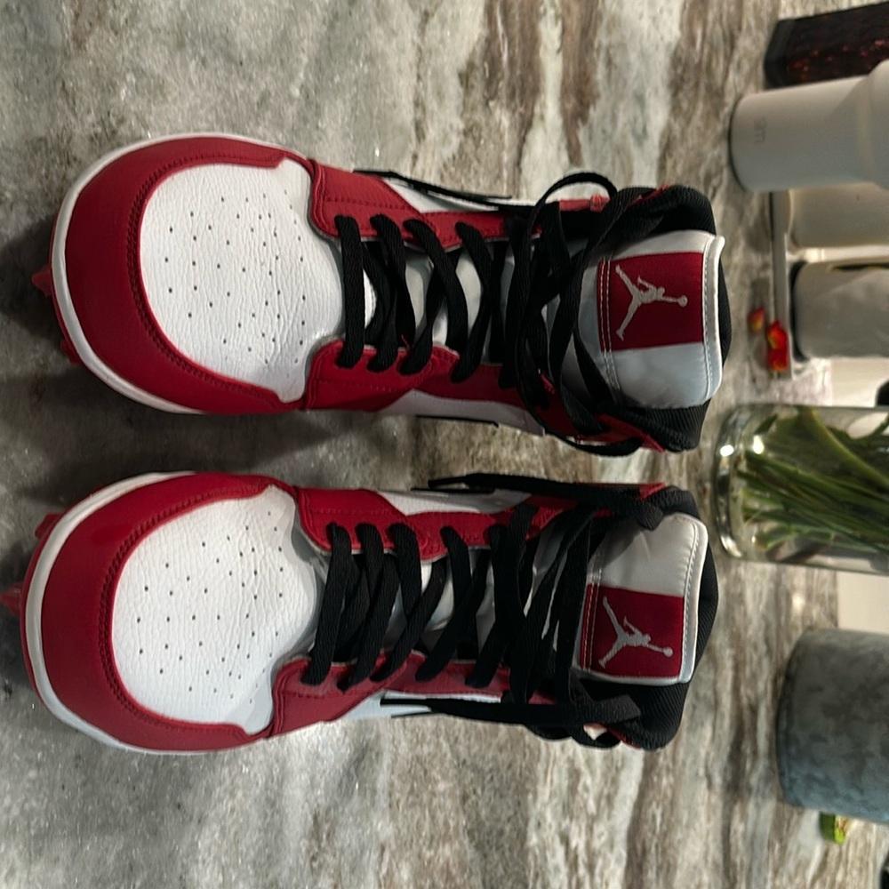 Size 11 Jordan’s cleats practically new. My son wore them twice.